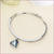 Rhodium Plated Ice Blue Heart Bracelet